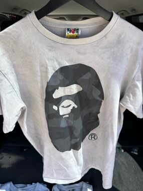 Bape Men's Light Gray Tee with Black/Grey Camo Ape Head Graphic